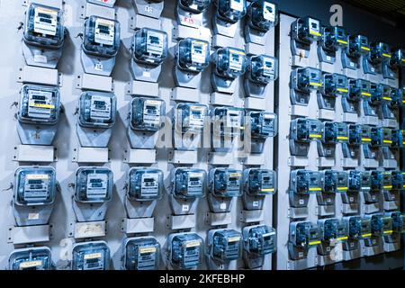 Electricity meters on panel in an apartment building. Bangkok, Thailand - 02.06.2020 Stock Photo