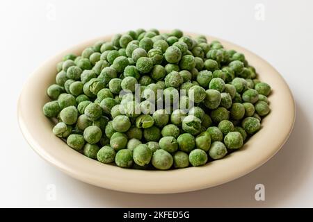 green peas on a white background Stock Photo