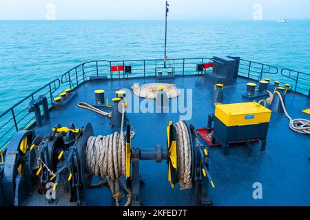 Ferry deck. Drum with mooring rope. Stock Photo