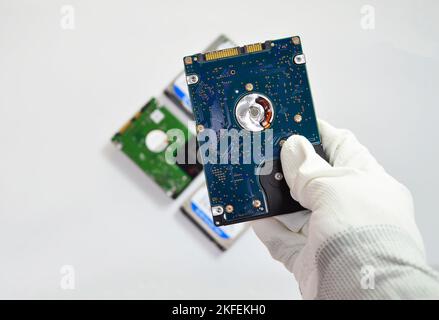 Hard disk drives are still widely used. placed on a white background) Stock Photo