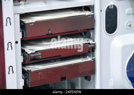 Side view of the 3 hard disks contained in the computer case. and a lot of dust Stock Photo