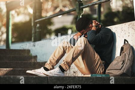 Depression, anxiety and African student sad about college fail, stress and mistake on campus. Mental health, education and black man with fear, angry Stock Photo
