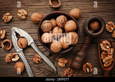 Various nuts on a wooden table. Top view with copy space Stock Photo