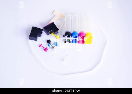 Image of equipment for creating ink tanks for printers. Stock Photo