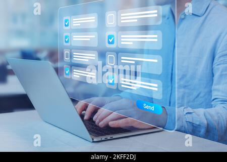 Questionnaire, quiz, assessment, or survey form with checkboxes on computer screen. Person answering online test with yes-no questions. Opinion, feedb Stock Photo