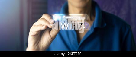 concept man using wifi technology 7 connected to the internet world with new technology Stock Photo