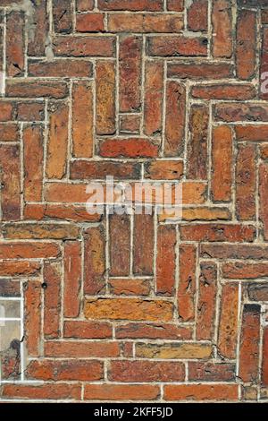 Brickwork from artfully arranged brick as background Stock Photo