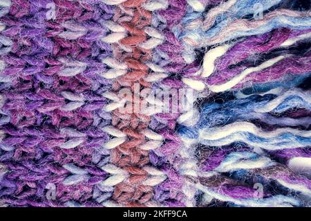 Handmade knitting background with detail wool threads. Stock Photo