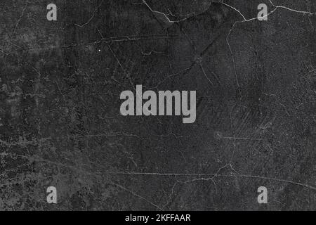 Black concrette wall, soot, carbon black, on the cement wall as texture or background Stock Photo