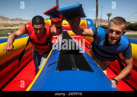 Left to right U.S. Navy Hospital Corpsman 3rd Class David Cagua and Pfc. Alex Goins both with Kilo Company, 3rd Battalion, 7th Marine Regiment (3/7), Stock Photo