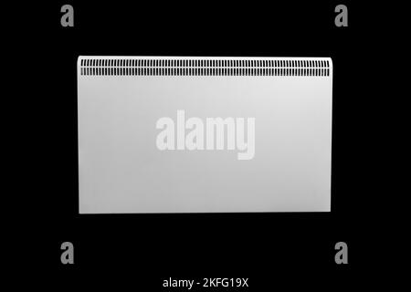 Electric heater battery isolated on black background. Radiator. Home electric heater convector isolated. Heating convector. Stock Photo
