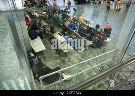 People wait at Euston Station in London on the third day of the rail strike. Stock Photo