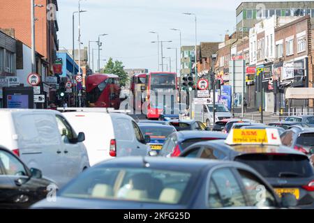 Double-decker buses are seen in and around a congested roundabout in Barking, East London, in the morning as the national rail strike is under way. Stock Photo