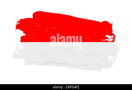 Stroke brush painted distressed flag of indonesia on white background Stock Photo