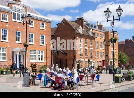 Ludlow Shropshire Ludlow College - Castle Square Campus and people sat in the market Place Ludlow Shropshire England UK GB Europe Stock Photo