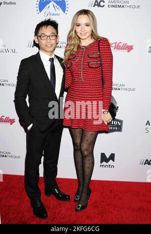 BEVERLY HILLS, CALIFORNIA - NOVEMBER 17: (L-R) James Wan and Ingrid Bisu attend the 36th Annual American Cinematheque Award Ceremony honoring Ryan Rey Stock Photo