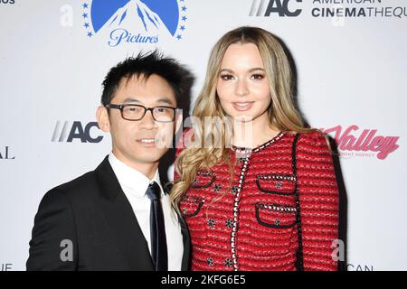 BEVERLY HILLS, CALIFORNIA - NOVEMBER 17: (L-R) James Wan and Ingrid Bisu attend the 36th Annual American Cinematheque Award Ceremony honoring Ryan Rey Stock Photo