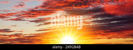 Sunset in the sky with clouds Stock Photo