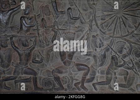 Carved Bas-relief mural Angkor Wat temple. Seam Reap, Cambodia. Famous temple complex built for the king Suryavarman II as his state temple Stock Photo