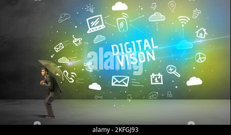Businessman defending with umbrella, modern technology concept Stock Photo