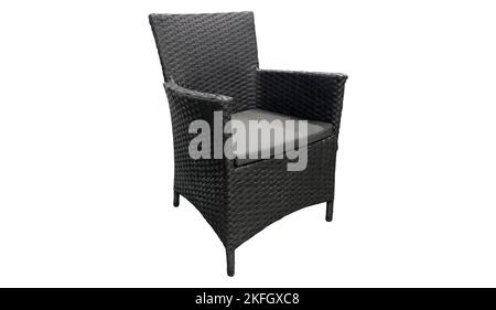 Outdoor rattan black chair isolated on white background. Wicker chair. Rattan chair isolated. Stock Photo