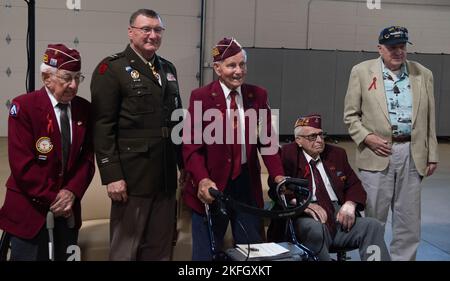 From left: Clyde Cassidy, Maj. Gen. Greg Knight, Richard H. Hamilton, William B. Busier, and Ralph McClintock pose for a group photo after the POW/MIA Day observance at Camp Johnson, Vermont, on Sept. 16, 2022. POW/MIA Day is observed the third Friday of September to honor veterans who were held as prisoners of war or who were missing in action. Knight is Vermont's adjutant general. Cassidy, Hamilton, and Busier are former World War II POWs, and McClintock is a former crew member of the U.S.S. Pueblo, which was captured by North Korea in 1968. Stock Photo