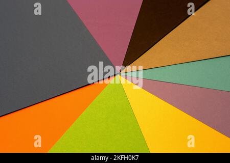 Many cards of different colors stacked on top of each other Stock Photo