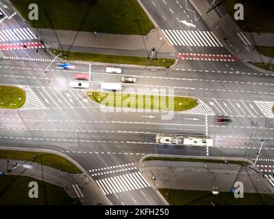 Night  traffic transportation at the roundabout street road, City and connection technology, futuristic abstract background for financial technology a Stock Photo