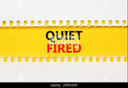 Quiet fired symbol. Concept words Quiet fired on yellow paper. Beautiful white background. Business and quiet fired concept. Copy space. Stock Photo