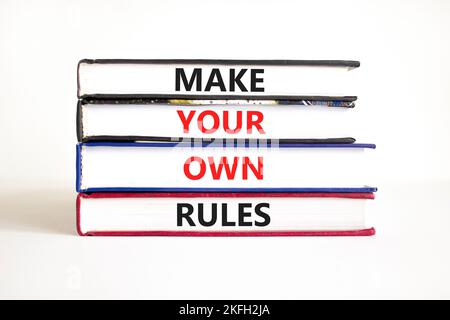 Make your own rules symbol. Concept words Make your own rules on books. Beautiful white table white background. Business motivational make your own ru Stock Photo