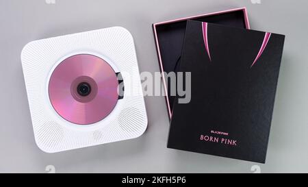 BlackPink BORN PINK 2nd Album Box set on grey with Pink music CD in retro player. Stylish CD album. South Korean girl group BlackPink. Gatineau, QC Stock Photo