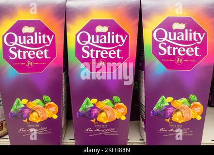 Boxes of Quality Street sweets, chocolates in supermarket Stock Photo