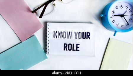 Text Know Your Role written on notepad and white background Stock Photo