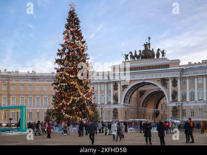 St. Petersburg, Russia - January 08, 2022: Christmas tree on Palace Square. A lot of people on Palace Square on New Year's holidays Stock Photo