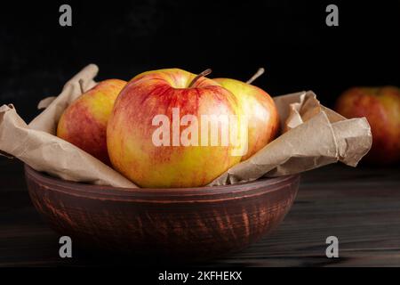 Fresh Gala apples on dark background. Red-yellow apples. Rustic style Stock Photo