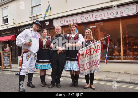 Based in Camden Town, London, Morena Slovak dance team take a break from performing their Slovakian dances at the Wimborne Folk Festival 2018 Stock Photo