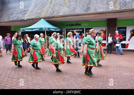 Oyster Girls, a dance team from the Isle of Wight, performing North West morris dancing at the Wimborne Folk Festival 2018 Stock Photo