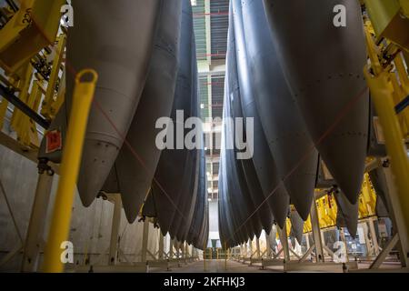 External aircraft fuel tanks are arranged on the vertical tank storage system in an 18th Component Maintenance Squadron fuels building at Kadena Air Base, Japan, Sept. 16, 2022. The high-density storage system requires approximately 88 percent less space per tank than horizontal storage. Stock Photo