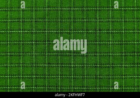 The texture of the green fabric in a large cell. Textile. fibers. checkered fabric Stock Photo