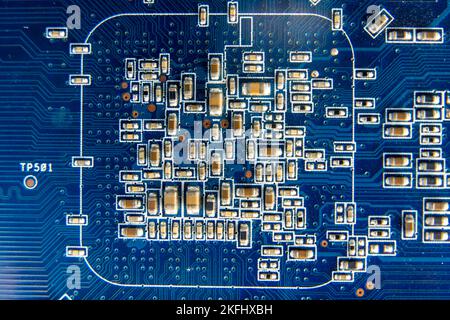 resistors on the blue printed circuit board. pcb Stock Photo