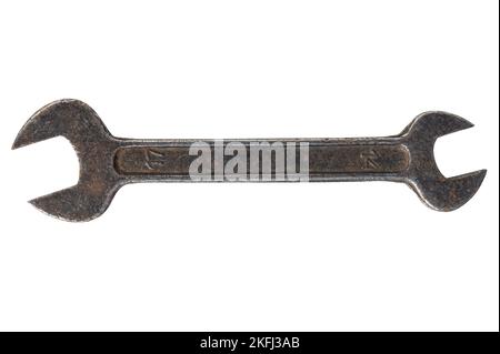 Old rusty wrench, spanner isolated on white background. Stock Photo