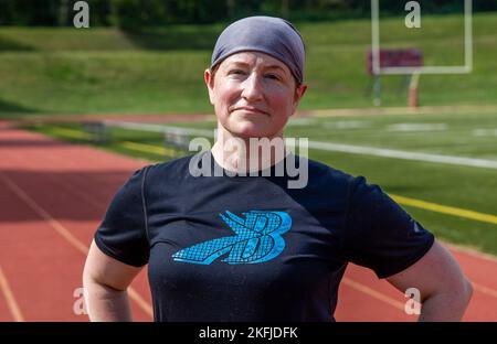 U.S. Marine Corps Gunnery Sgt. Nancy Wright, retired, poses for a photo at Butler Stadium on Marine Corps Base Quantico, Virginia, Sept. 19, 2022. Wright will be running in the upcoming Marine Corps Marathon.  (US Marine Corps photo by Lance Cpl. Kayla LeClaire) Stock Photo