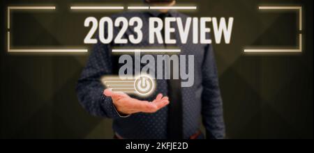 Conceptual caption 2023 Review. Concept meaning seeing important events or actions that made previous year Stock Photo