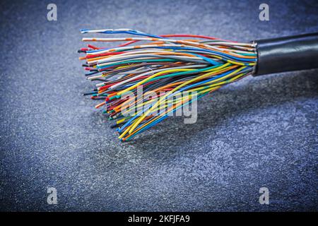 Multicolored electric cables on black background electricity concept. Stock Photo