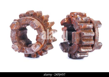 very old dusted and rusted machine cogwheels isolated on white background Stock Photo