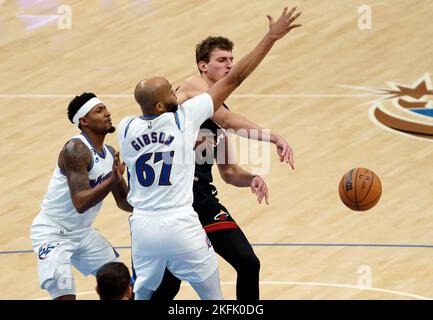 Washington, USA. 18th Nov, 2022. WASHINGTON, DC - NOVEMBER 18: Miami Heat forward Nikola Jovic (5) passes away from Washington Wizards forward Taj Gibson (67) during a NBA game between the Washington Wizards and the Miami Heat, on November 18, 2022, at Capital One Arena, in Washington, DC. (Photo by Tony Quinn/SipaUSA) Credit: Sipa USA/Alamy Live News Stock Photo