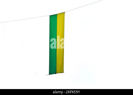 Brazilian flag is hanging against white background Stock Photo