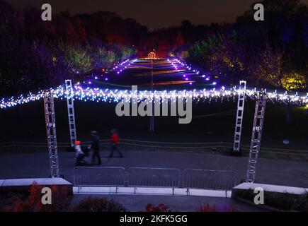 People tour the holiday light installationsat Lightscape, an after-dark, illuminated immersive trail that celebrates the beauty of winter, at Brooklyn Botanic Garden  on Friday, November 18, 2022 in New York City.     Photo by John Angelillo/UPI Stock Photo