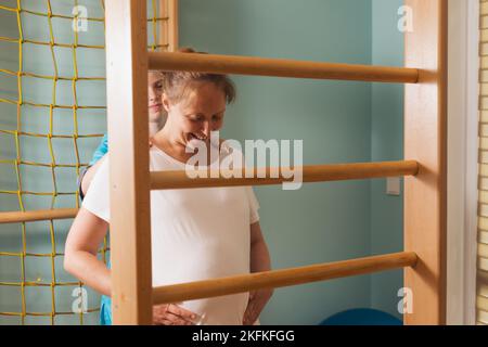 Pregnant woman trying to breath to soothe the pain of her labor contractions Stock Photo