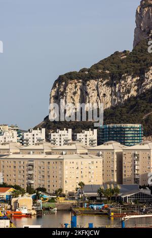 City Buildings, Port and Mountain by the Sea. Sunny Sky. Gibraltar, United Kingdom Stock Photo